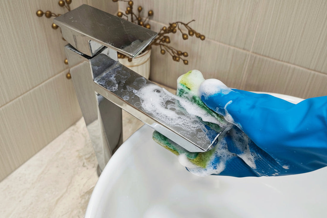 Hard water damage on the bathroom tap